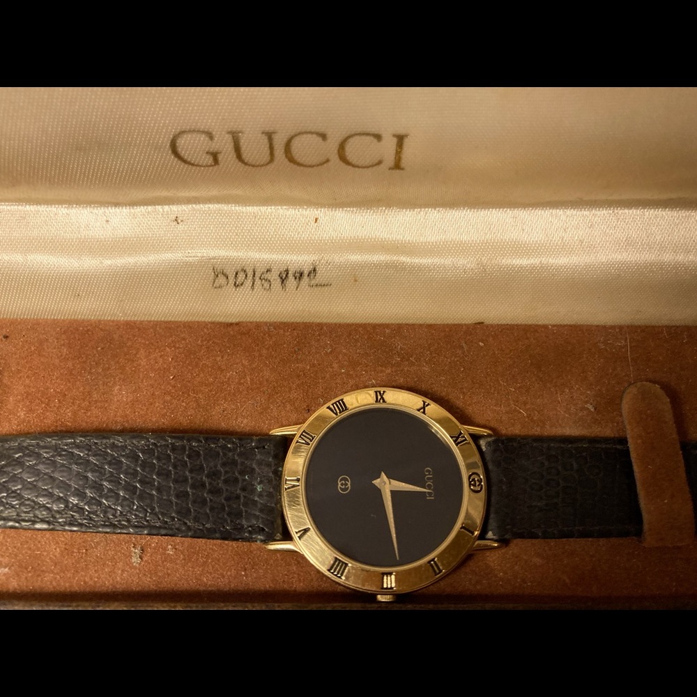 Gucci unisex 3000 M gold watch black leather band